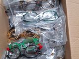 a cardboard box with a bunch of glasses in it