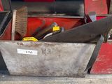 a tool box with tools in it sitting on the floor