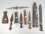 many different types of knives and knives on the table