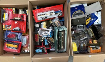 two boxes of toy cars and other toys in them