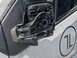 a car that has a broken engine in the side of it