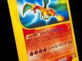 a close up of a pokemon card on a black background