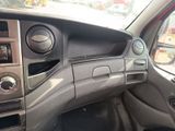 a dashboard of a car with a steering control panel