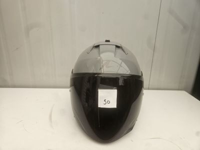 motorcycle helmet sitting on a table with a price tag on it