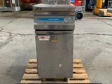 an image of a commercial fryer sitting on top of a wooden pallet