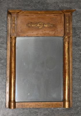 a mirror that is on the wall in the room