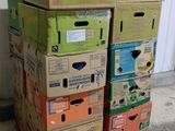 many boxes stacked on top of each other on a pallet