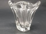 an image of a clear glass vase sitting on top of a table