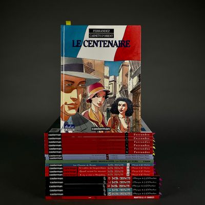 books stacked on top of each other on a black surface