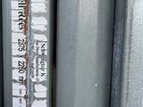 a close up of a piece of metal with a sticker on it