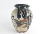a vase with a painting on it on a white background