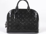a black louis vuitton handbag on a white background