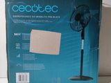 une image représentant une boîte sur laquelle est posé un ventilateur