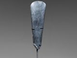 a close up of a metal object on a stand on a gray background