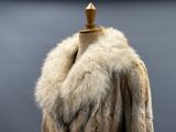 an image of a fur coat on a mannequin