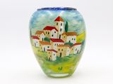 un vase sur lequel est représentée une ville