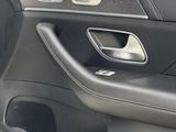 a close up of a car door handle with the door handle open