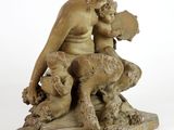statue of a woman with a dog and a cat on a marble base
