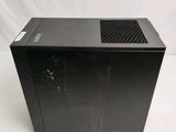 an image of a black computer case sitting on top of a white surface