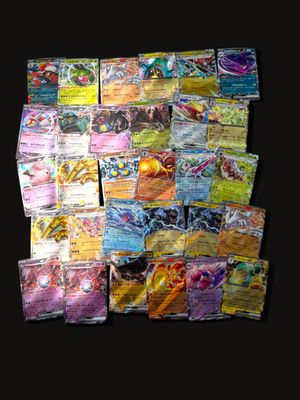 many different types of pokemon cards on a black background