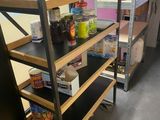 a shelf that has a lot of food on it