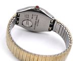an image of a close up of a wrist watch on a white surface