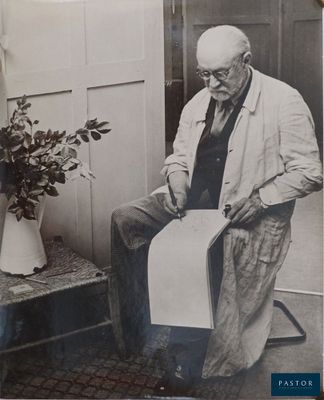 a black and white photo of an old man sitting on a chair