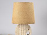 an elephant lamp with a burlock shade on top of it