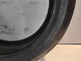 a close up of a tire tire on a white surface