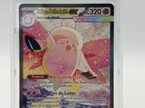 a close up of a pokemon card in a plastic case