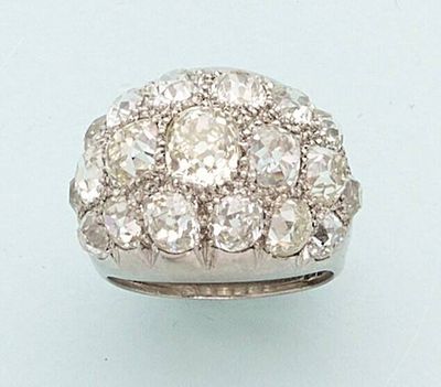 an 18k white gold diamond cluster ring
