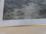 a black and white photo of a boat in the water