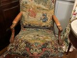 a chair that is sitting in the corner of a room