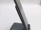 a cell phone that is sitting on a stand