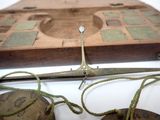 a pair of scissors and a pair of bells on a table