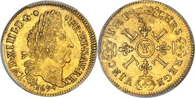une pièce d'or « sovereign » sur laquelle figure le portrait d'une femme