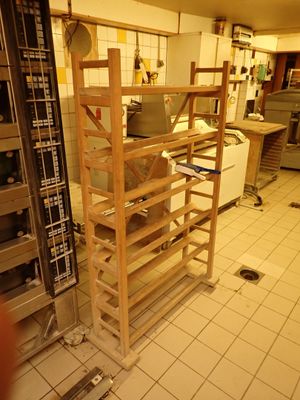 an image of a kitchen with a bunch of shelves