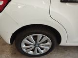 a white car that is parked in a garage