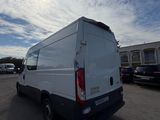 a white van that is parked in a parking lot