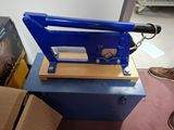 a blue machine that is sitting on top of a blue box