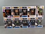 a lot of funko pop vinyl figures in the box