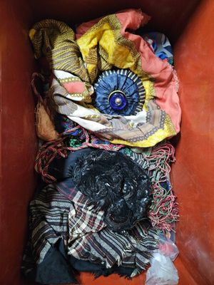 a box full of clothes and other items in it