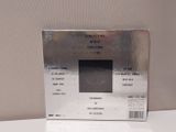 a picture of a silver box on a white table