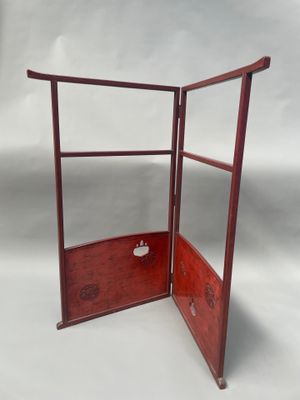 an image of a wooden display case with a mirror on it