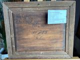 a picture of a wooden frame with writing on it