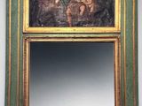 an image of a mirror with a painting of a man and a woman