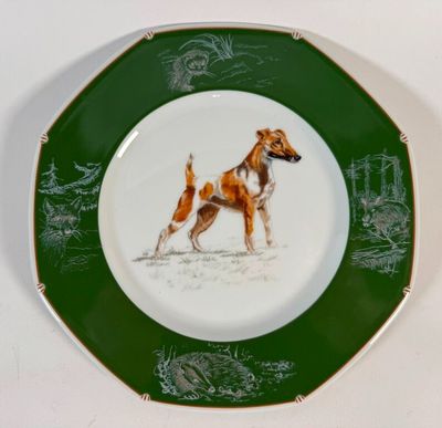 HERMÈS Partie de service CHIENS COURANTS & CHIENS D'ARRÊT Porcelaine Un plat rond, un plat ovale, un plat creux, cinq assie