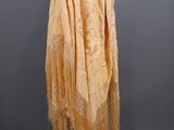 a yellow shawl on a mannequin mannequin mannequin mannequin mannequin mannequin mannequin mannequin manne