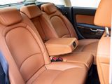 the interior of a car with tan leather seats and black trims
