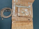 an image of a purse with a cord attached to it